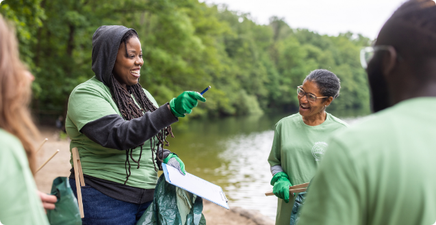 women by river